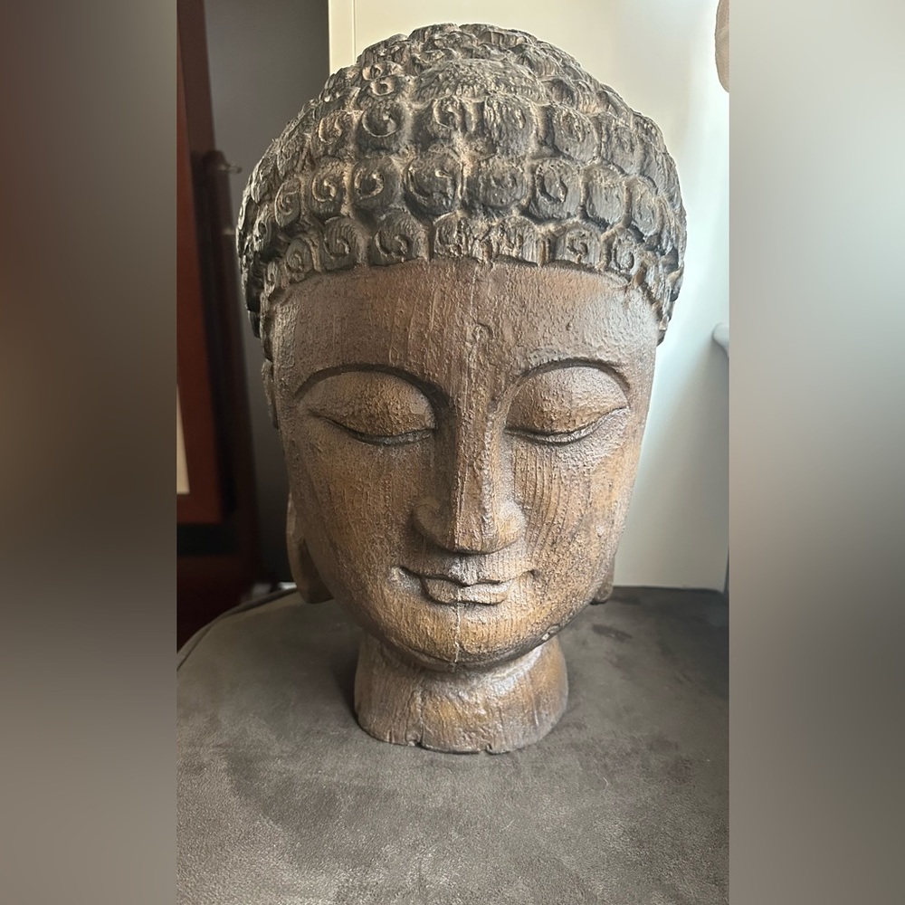 Giant wood Buddha head